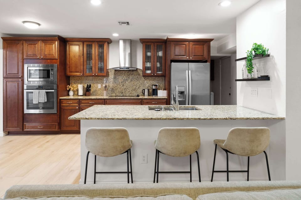 Cook in Style – This kitchen features high-end appliances, ample storage, and everything you need for a seamless culinary experience.
