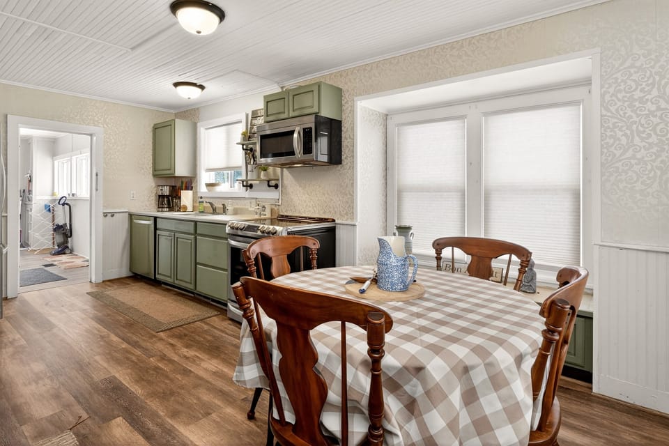 Spacious main floor kitchen with additional seating