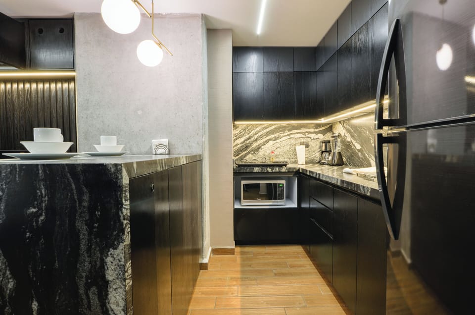 City Studio, Balcony, City View | Private kitchen | Blender, griddle, cleaning supplies