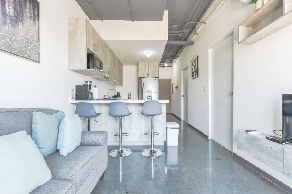 Comfort Suite, Balcony, City View | Living area | 55-inch Smart TV with digital channels, streaming services