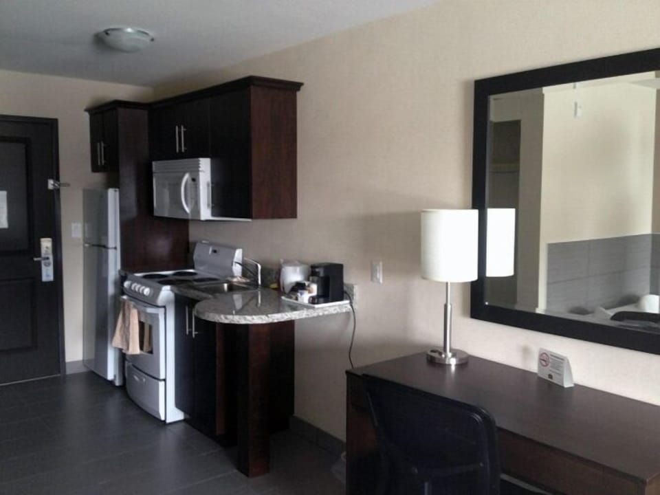Coffee/tea maker, microwave, cookware/dishes/utensils