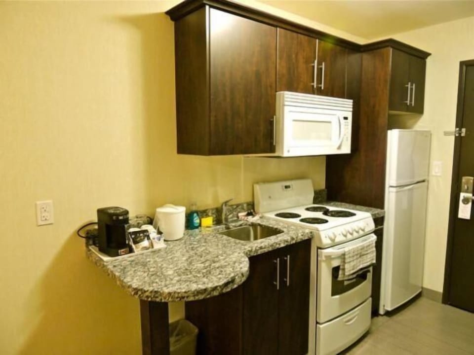 Coffee/tea maker, microwave, cookware/dishes/utensils