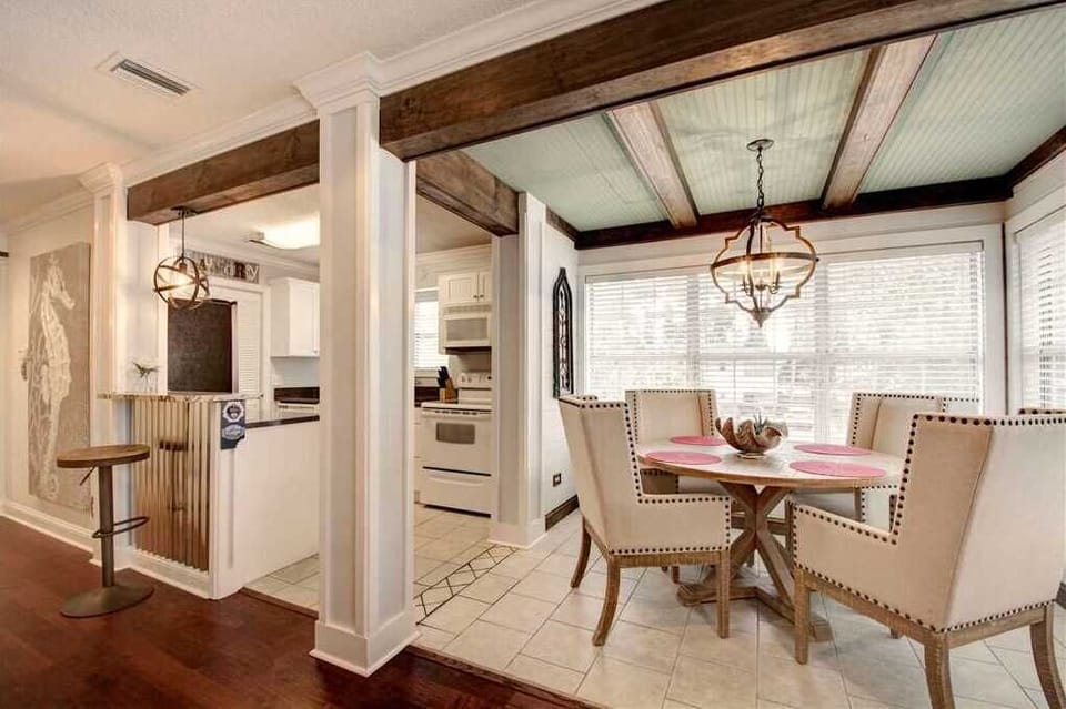 View of dining area and kitchen.