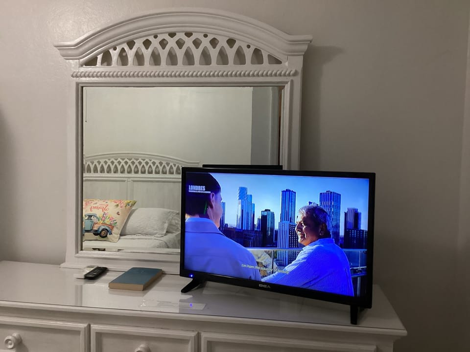 Comfort Condo, Balcony, Garden View | Iron/ironing board, WiFi (free), individually decorated