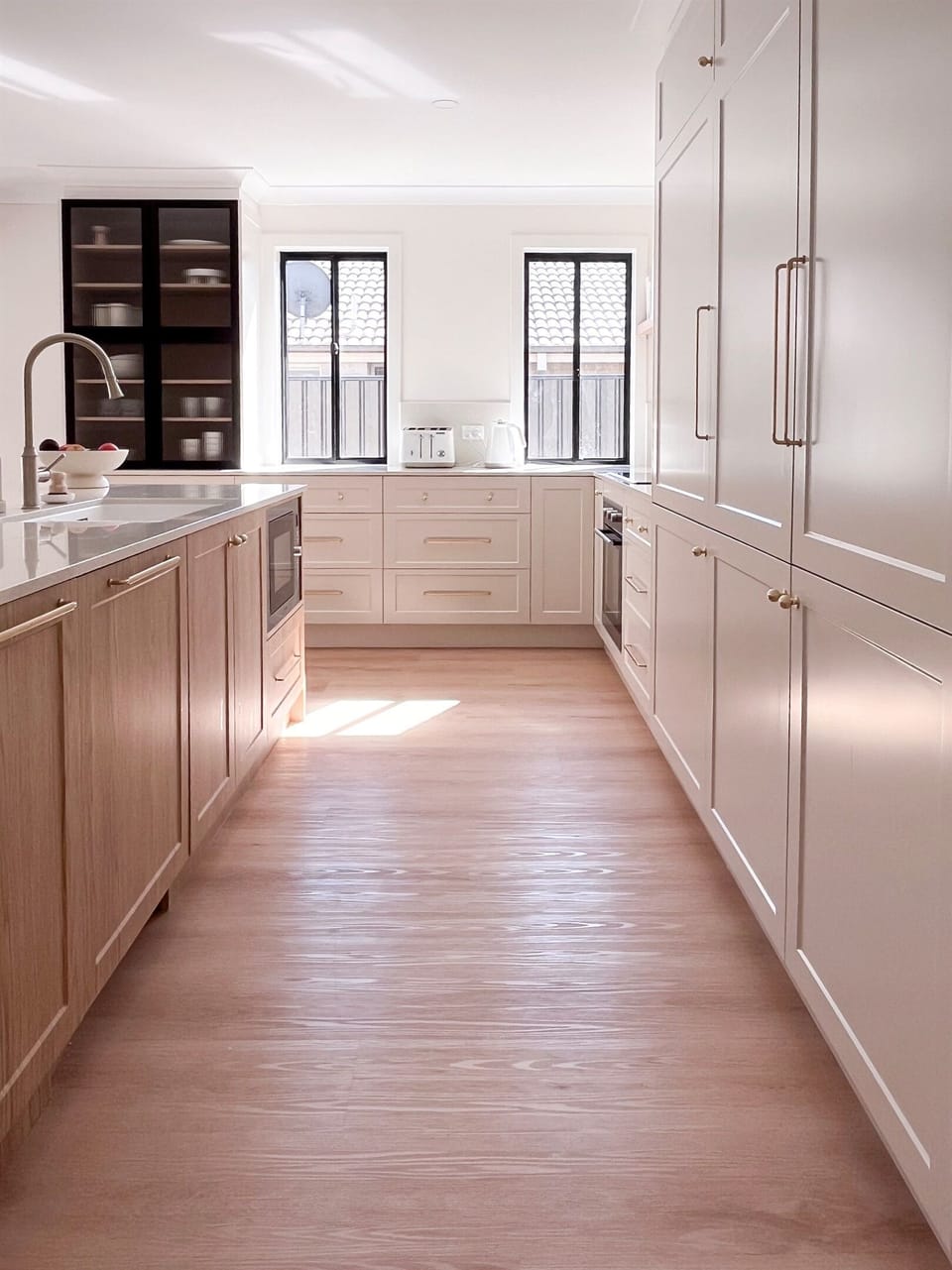 Kitchen : Wide kitchen drawers add useful storage beside the island, helping keep cookware and everyday items within easy reach.