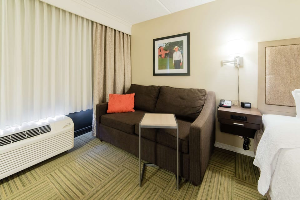 Room, 1 King Bed with Sofa bed, Lake View (Hearing) | Living area | 32-inch LCD TV with cable channels, TV