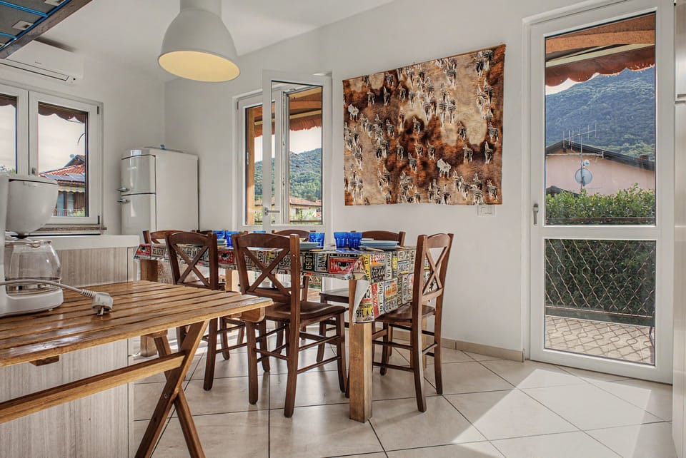 Apartment 'Sunset On Lake Maggiore 2 Garages' with Garden, Balcony and Wi-Fi Apartment in Lombardy
