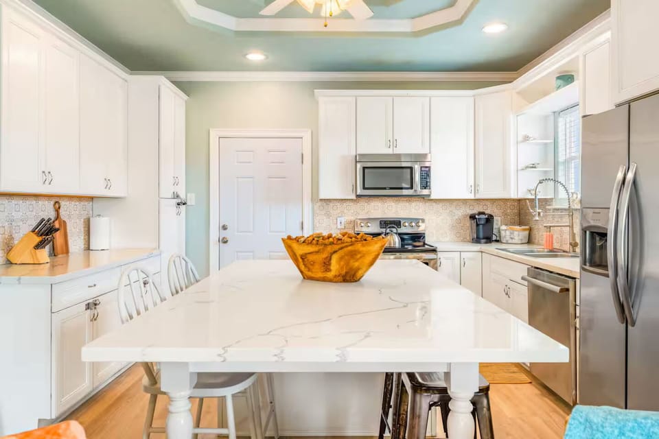 Chef’s Kiss. 🥂 A fully stocked, gourmet kitchen with sleek finishes and all the essentials. From morning espresso to full family feasts, we’ve made sure you have everything you need to feel right at home.