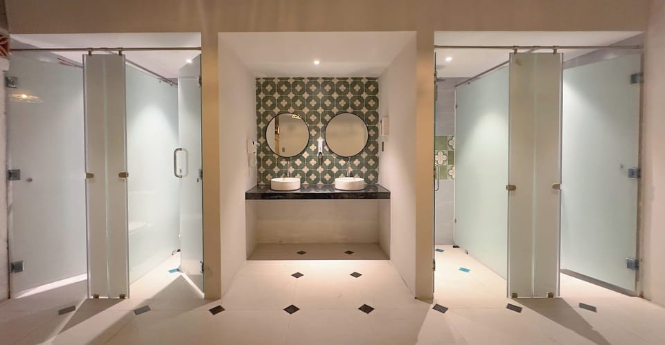 Shower, rainfall showerhead, hair dryer, towels