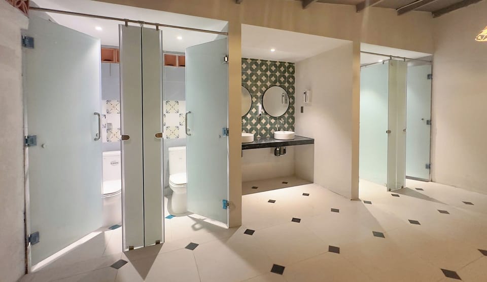 Shower, rainfall showerhead, hair dryer, towels