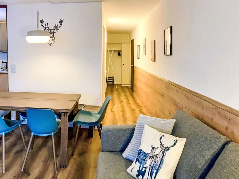 Furniture, Interior Design, Flooring, Wood, Floor, Ceiling, Wood Flooring, Room, Table, Lighting