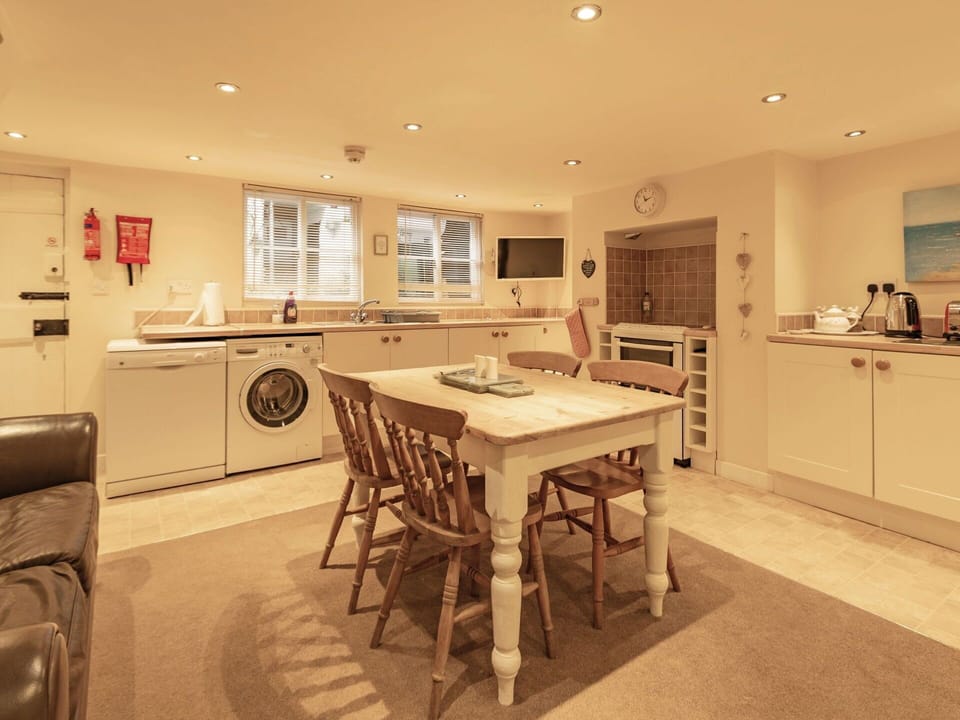 Interior Design, Furniture, Flooring, Floor, Wood, Ceiling, Room, Lighting, Cabinetry, Light Fixture