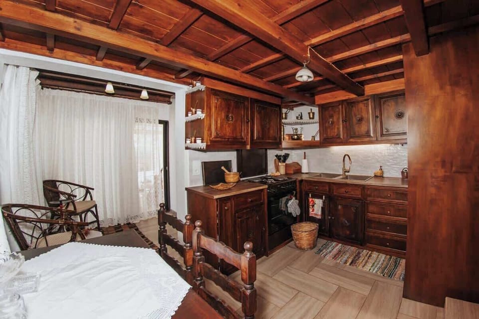 Modern kitchen amenities wrapped in rustic design.