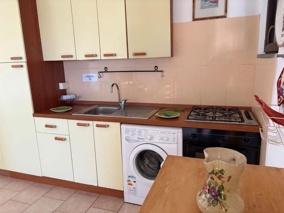 Classic Apartment, Patio, Garden View | Private kitchenette | Fridge, stovetop, cookware/dishes/utensils, dining tables