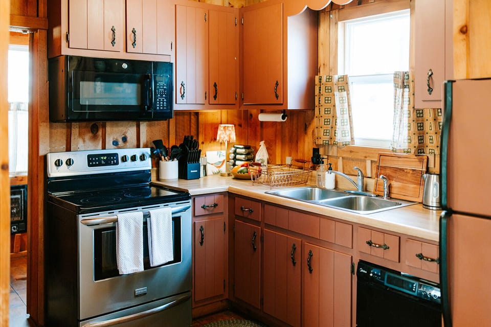 A cozy, well-stocked kitchen with everything you need to cook.