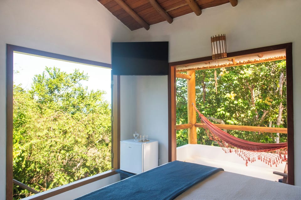 Deluxe Suite, Lanai, Partial Sea View | Blackout drapes, iron/ironing board, free WiFi
