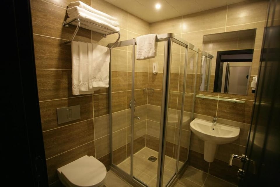 Rainfall showerhead, free toiletries, hair dryer, bathrobes