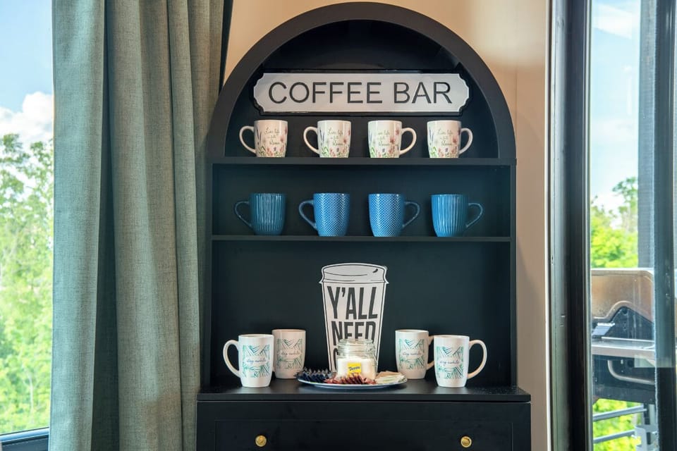 Your own coffee bar awaits, stocked with mugs and all the essentials to kickstart your mornings at your own pace.