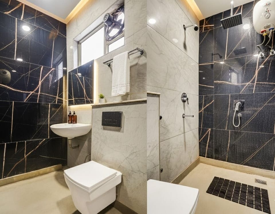 Deluxe Double Room | Bathroom | Shower, free toiletries, slippers, towels