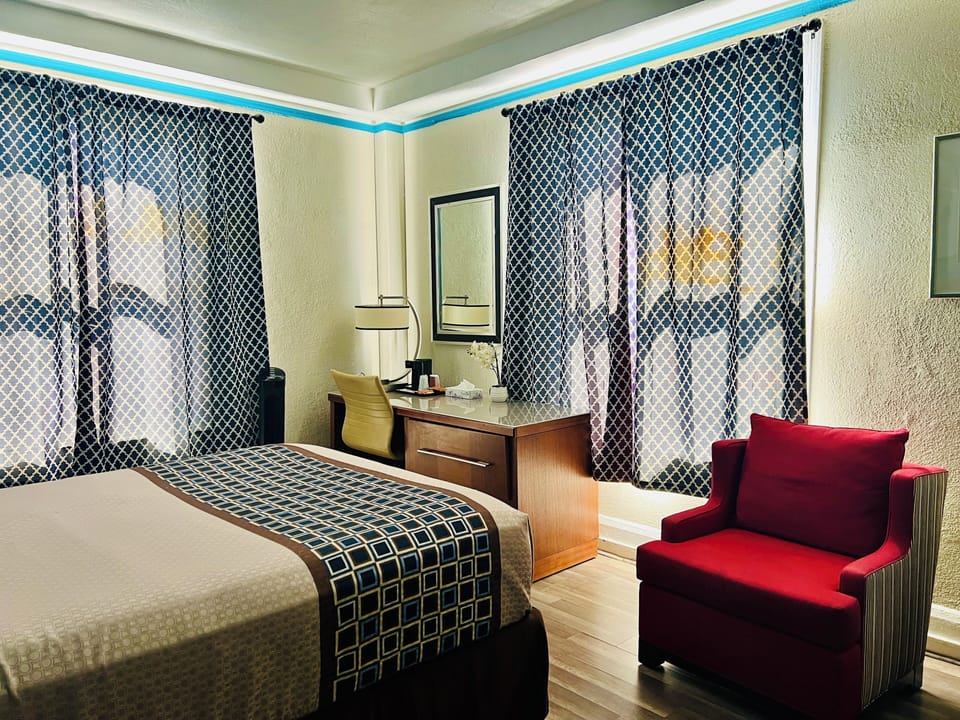 Standard Room, 1 Queen Bed, Private Bathroom | Desk, blackout drapes, free WiFi, bed sheets