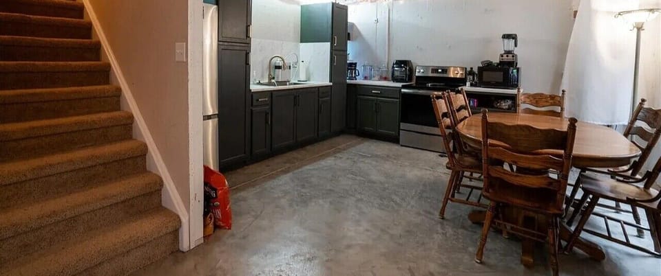 Your spacious kitchen and dining area features modern appliances and a welcoming table where you can enjoy home-cooked meals together.