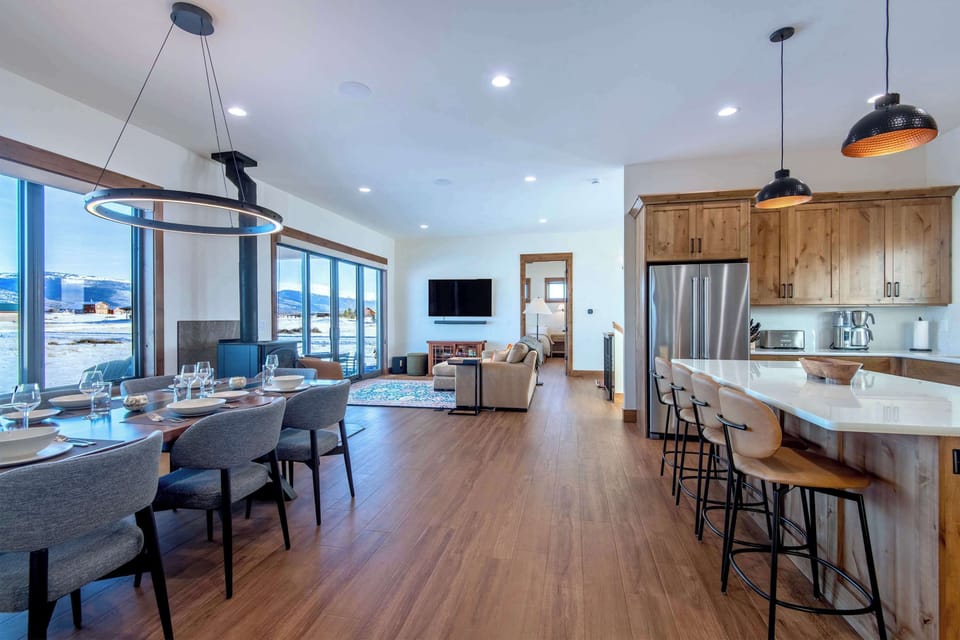 Seamless great room connecting kitchen, dining, and living spaces.