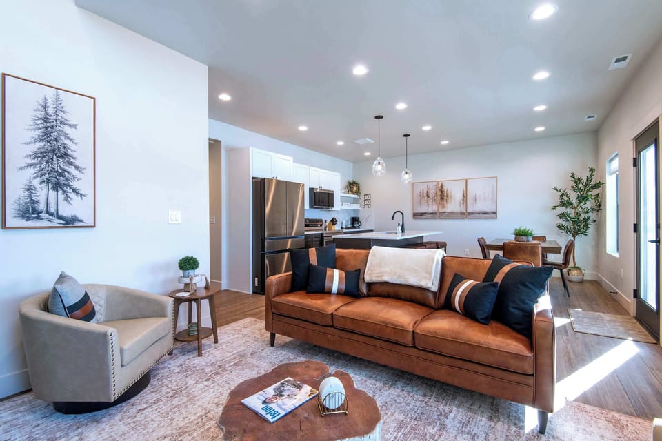 Open-concept living space connecting seamlessly to kitchen and dining.