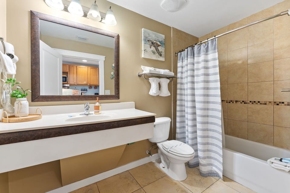Step into your spa-like bathroom with elegant tiling, premium amenities, and thoughtful touches that make getting ready a pleasure.