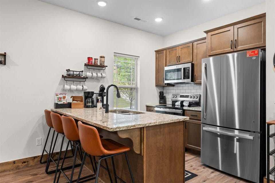The inviting kitchen offers ample space & all the comforts of home​