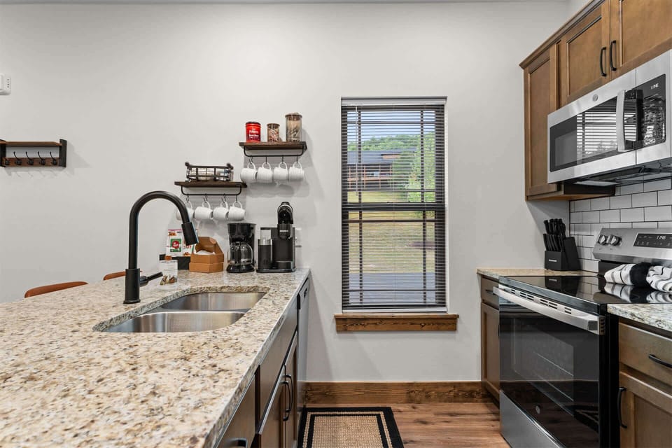 The inviting kitchen offers ample space & all the comforts of home​