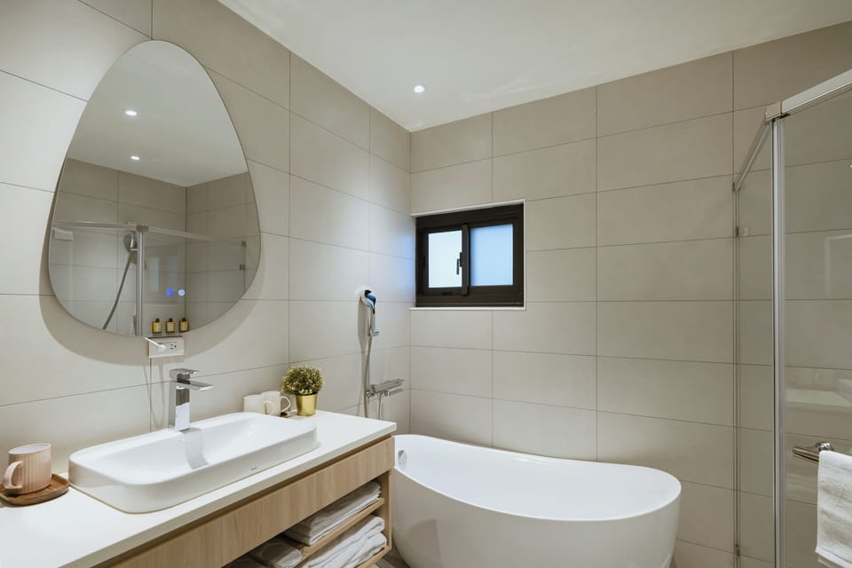 Hair dryer, slippers, bidet, towels
