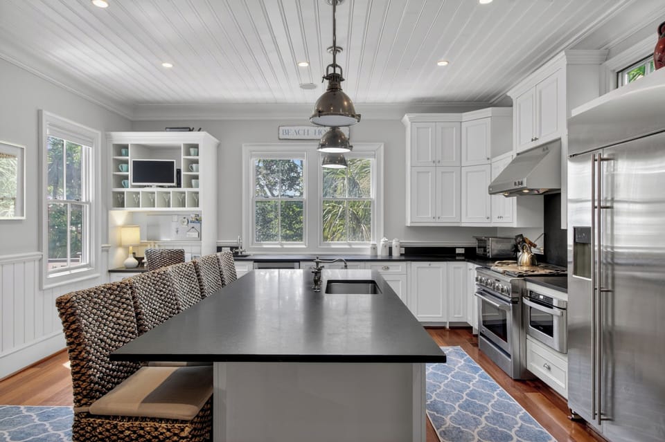 Your dream kitchen awaits with gleaming countertops, professional appliances, and a cozy breakfast nook where you'll savor morning coffee.