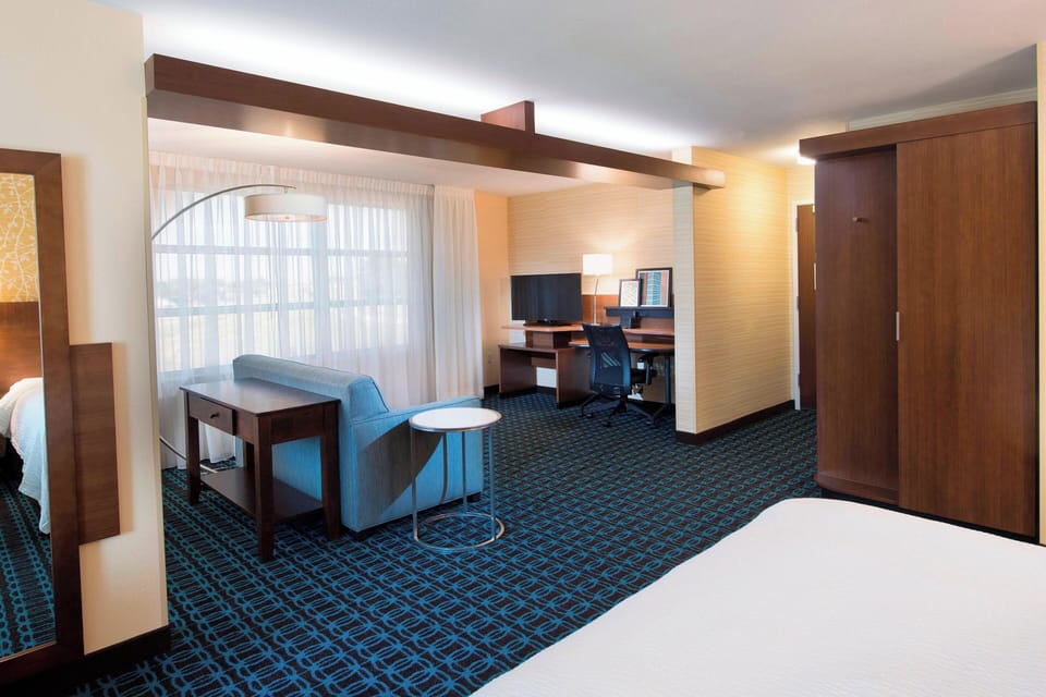 Suite, Multiple Beds | Pillowtop beds, desk, iron/ironing board, free WiFi