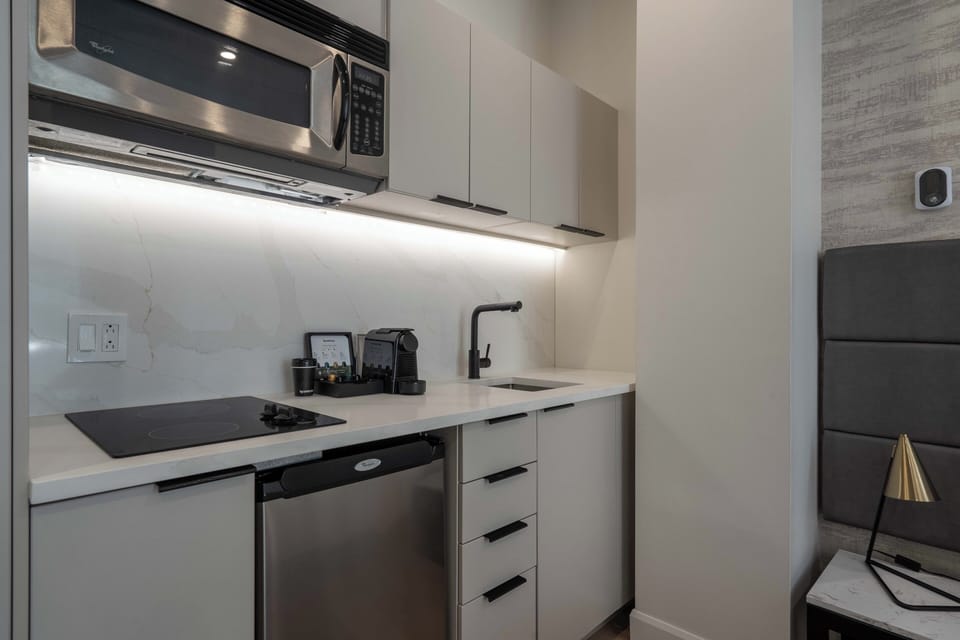 Suite, 1 King Bed, Non Smoking | Private kitchen | Coffee/tea maker