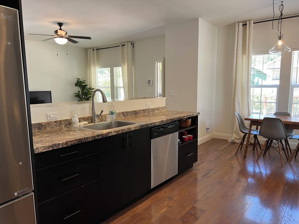 Spacious dining area adjacent to kitchen.