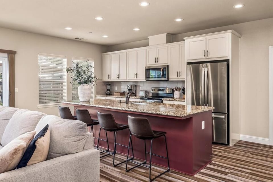Oversized island with bar seating to enjoy family and friends while cooking