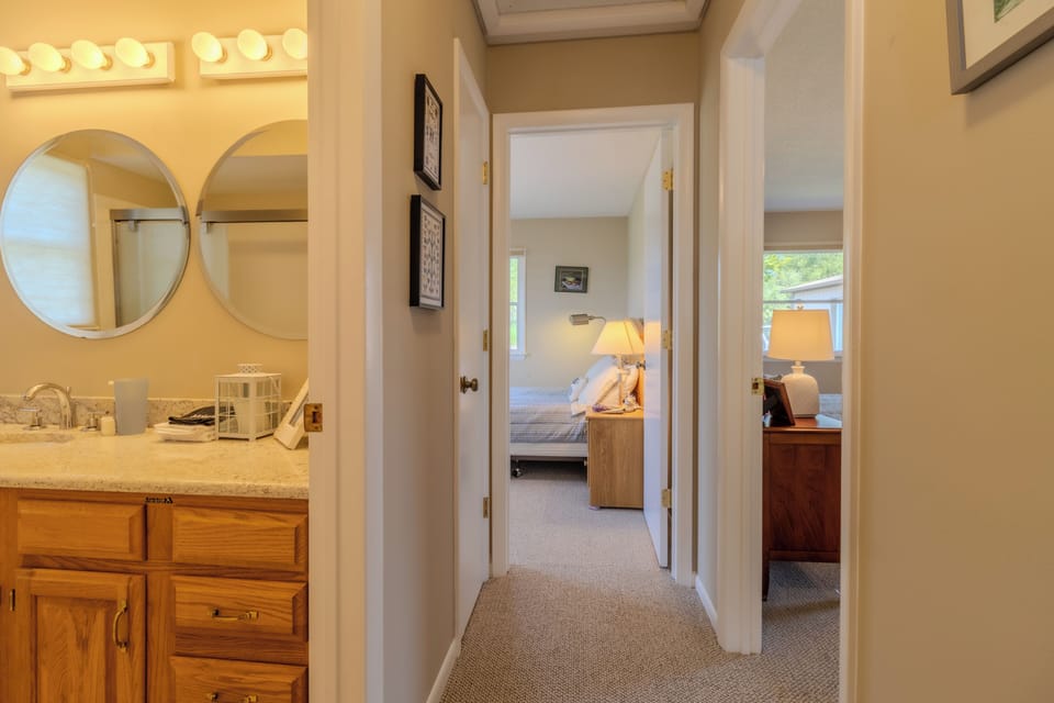 Hallway looking from primary bedroom to the other bedrooms
