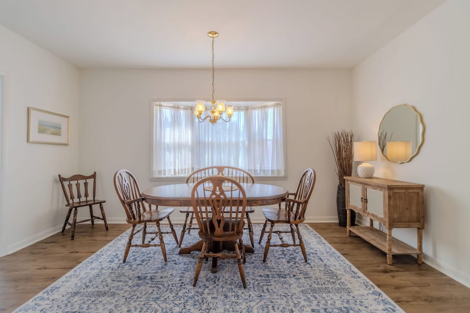 Dining Room - Main dining room. Living room is off to the right of this photo. One bedroom and a bathroom are located at the camera's POV. The kitchen is off to the left.