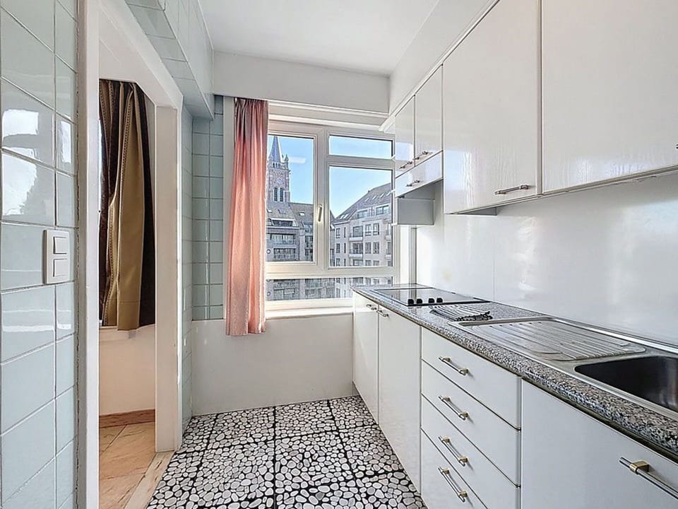 Flooring, Kitchen, Countertop, Interior Design, Floor, Apartment, Major Appliance, Cabinetry, Kitchen Appliance, Plumbing Fixture
