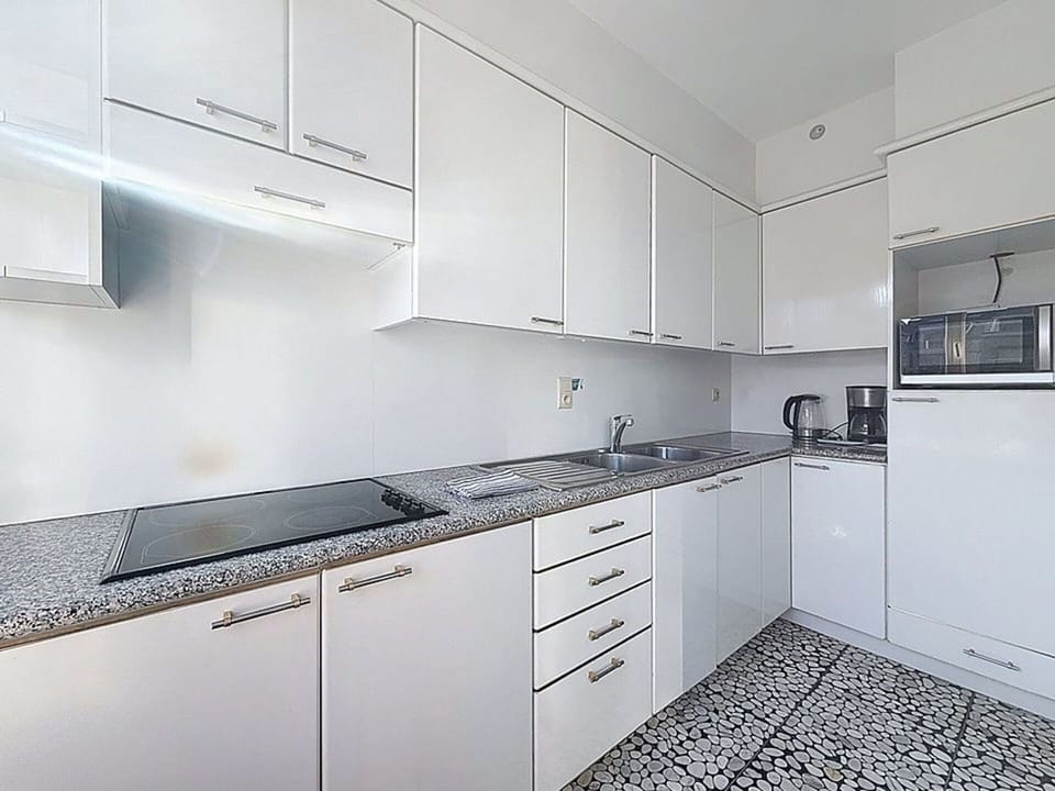 Kitchen, Countertop, Kitchen Appliance, Cabinetry, Flooring, Major Appliance, Interior Design, Floor, Home, Kitchen Sink