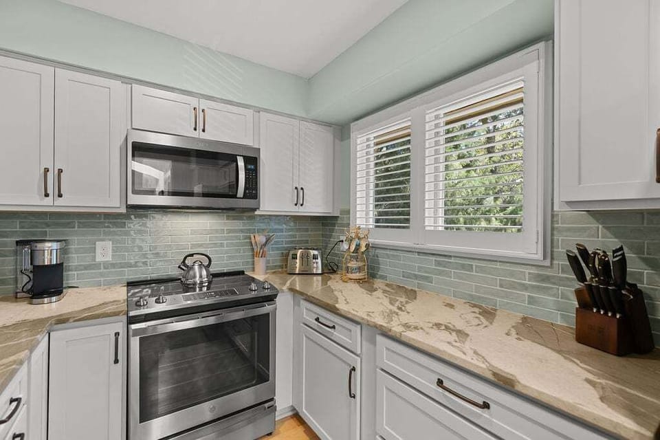 fabulous natural light enters this well stocked kitchen