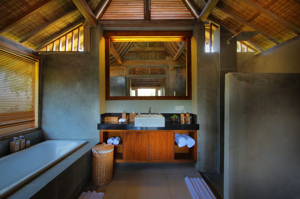 Joglo Two Bedrooms Villa, Private Pool | Bathroom | Separate tub and shower, rainfall showerhead, free toiletries
