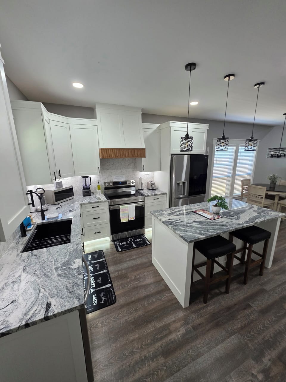 Kitchen,microwave, coffee maker, oven, toaster,blender,refrigerator, stovetop,