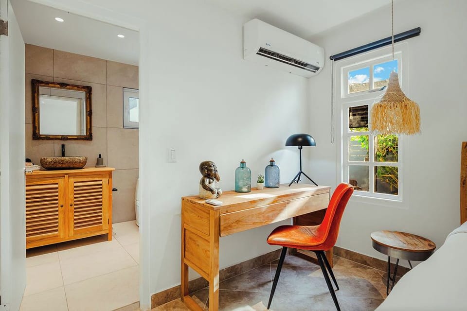 Bright bedroom with cool air-conditioning and peaceful views—perfect for families or friends traveling together.