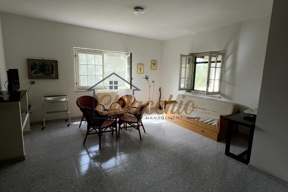 Villa, Patio, Partial Sea View | Living area | Flat-screen TV, fireplace