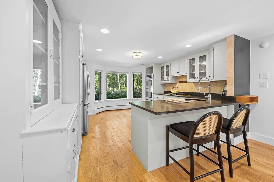 Large kitchen with peninsula seating.