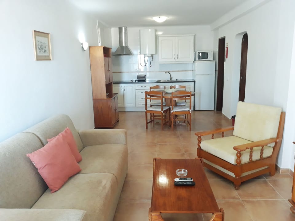 Standard Apartment, 1 Bedroom, Pool Access, Ground Floor | Living area | TV