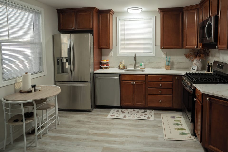 Fully equipped kitchen for preparing meals, morning coffee, and family dinners.