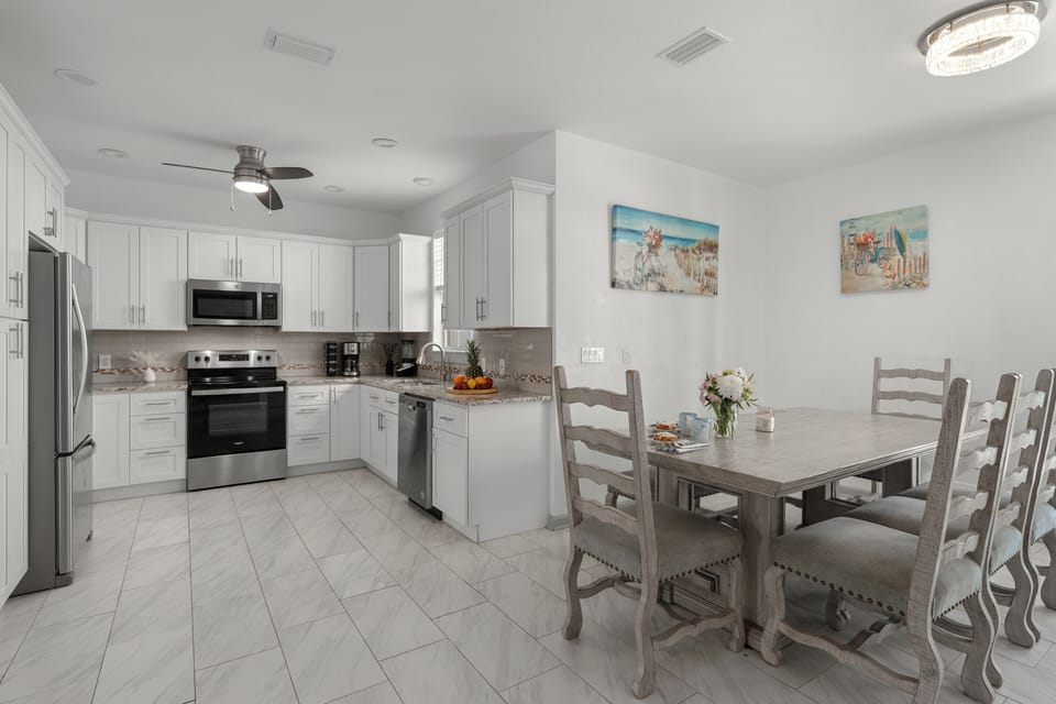 View from the dining area showing the open-concept kitchen layout.