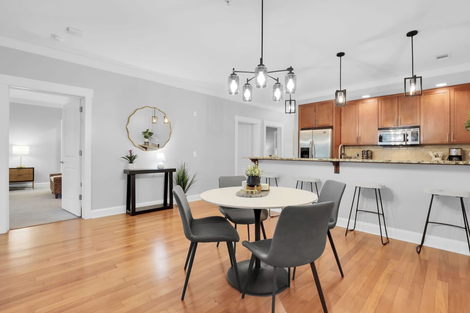 Kitchen and dining area with pendant lightings.
